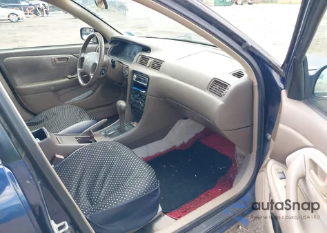 1997 Toyota Camry Le z USA, uszkodzony, nr VIN 4T1BG22K4VU805736